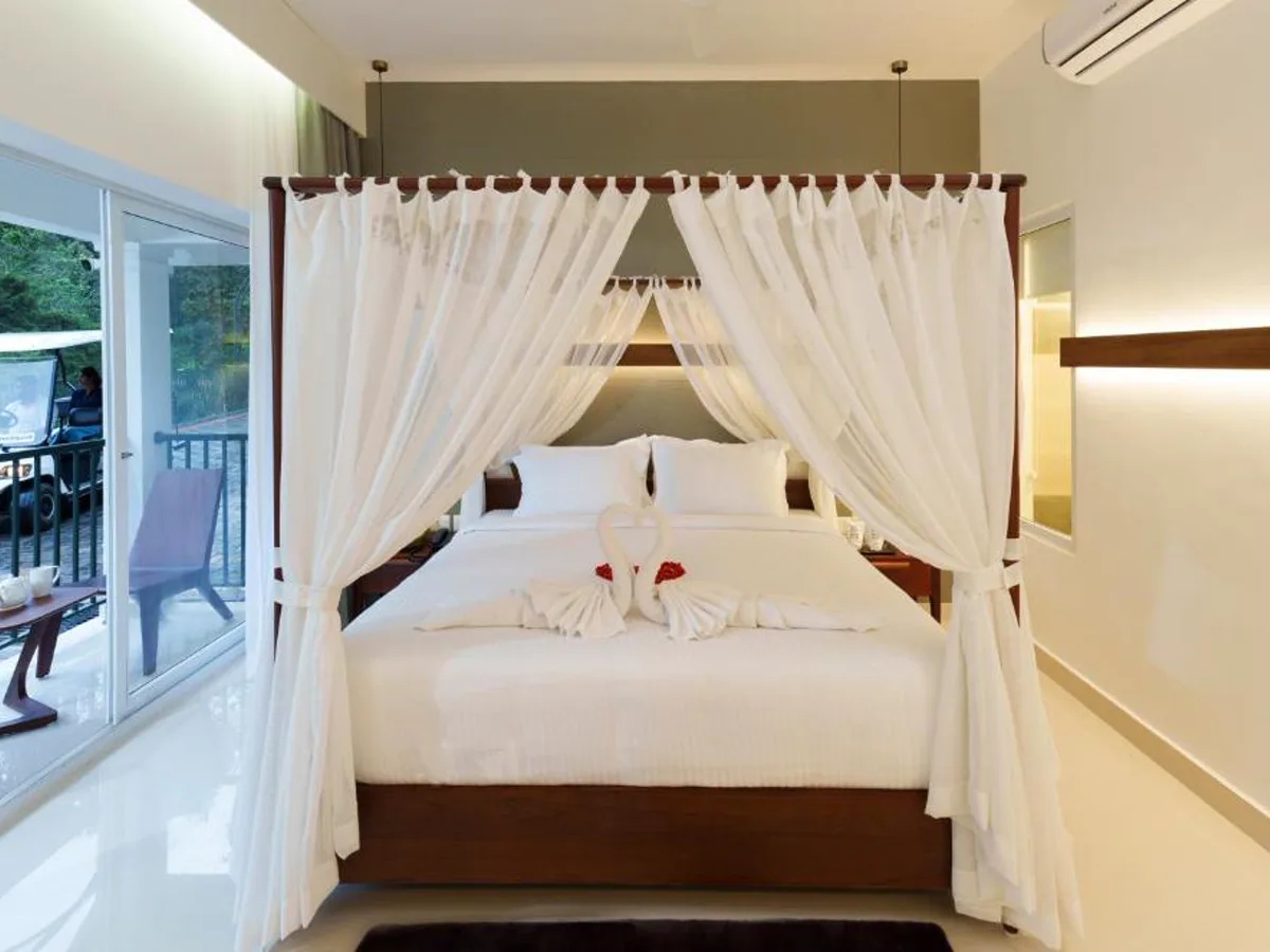 Номер с балконом в Eden Woods Resorts & Spa в Муннаре